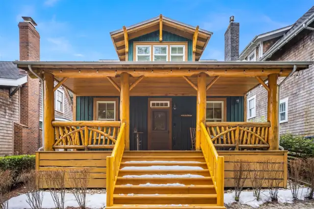 Into the Woods is known for its impressive real log front porch and corbels, custom designed from locally sourced cedar and pine logs.