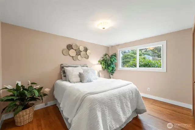 Primary Bedroom with Hardwood floors.