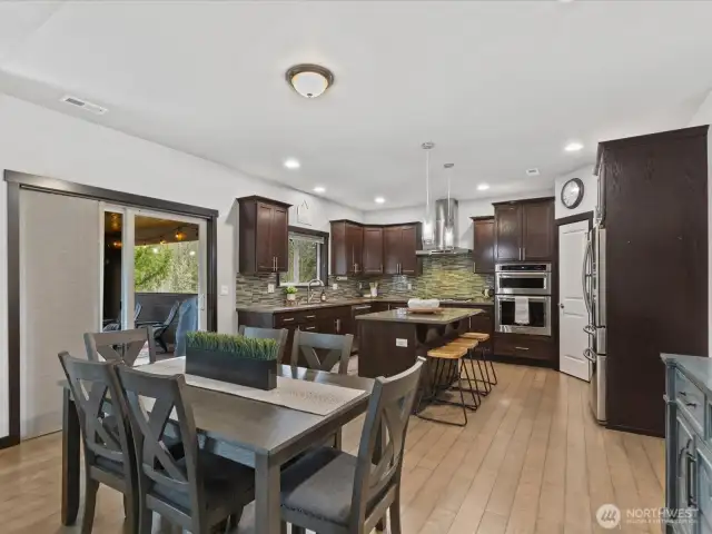 Second dining area off the kitchen. Slider to the large covered porch.