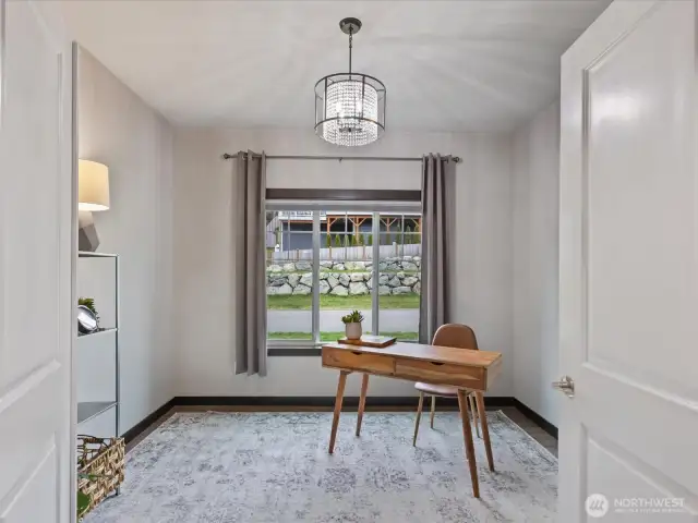 A quiet, dedicated main floor office space with ample natural light and plenty of room.