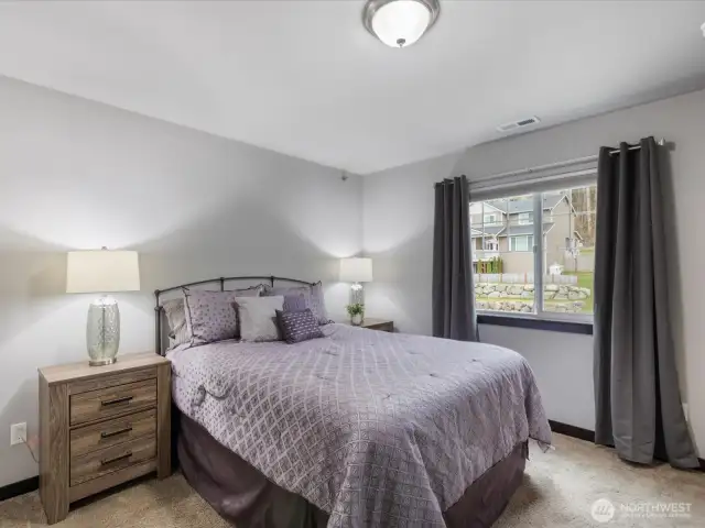 Bedroom #2: A bright and spacious bedroom with generous closet space and large windows, providing a comfortable retreat for guests or family members.