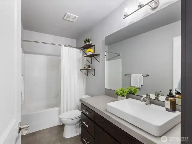 Upstairs Bathroom adjacent to bedrooms.