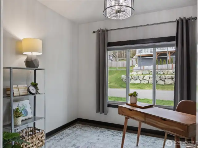 A quiet, dedicated main floor office space with ample natural light and plenty of room.