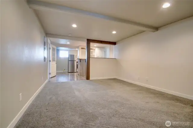 Lower level living room open to kitchen