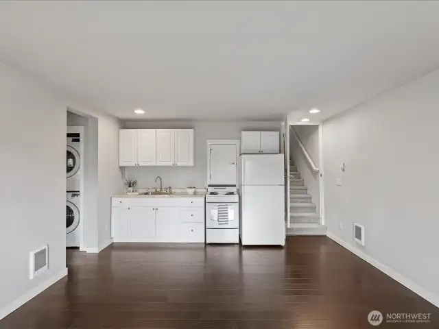 Full Kitchen and laundry located in the basement.