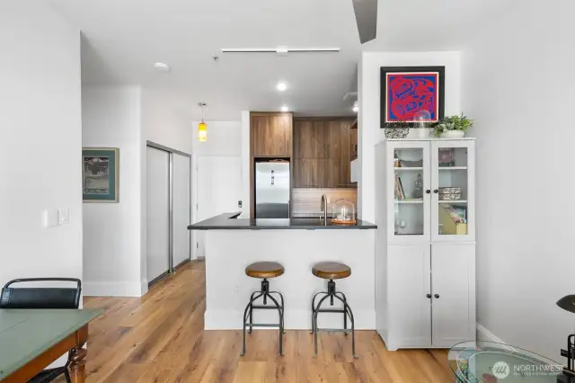 Open concept layout where owner added in the convenient breakfast bar with the full kitchen remodel!
