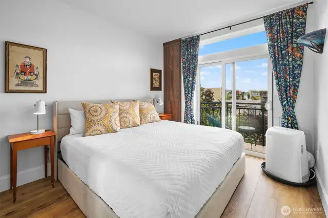 Spacious bedroom that fits this amazing King Size dreamy bed! With slider to your own private balcony!