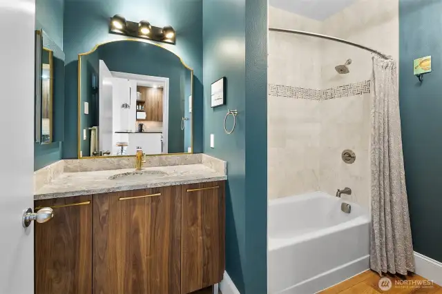 Spacious bathroom was also redone in 2024 (again cabinets with storage is so thoughtfully designed to maximize space)!