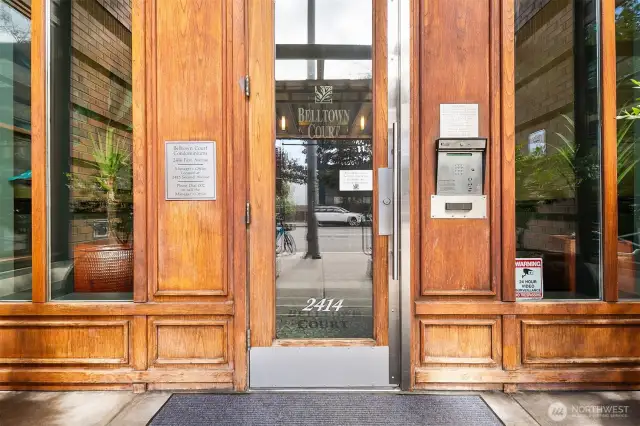 Entry to unit building on First Ave.  Note that Belltown Court has two buildings.  They have a full time concierge that is located in the 2nd Ave building but another separate entrance for condo owners who live in 1st Ave building where this unit is located for added convenience.