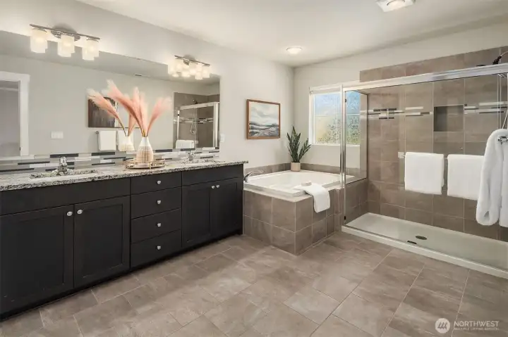 Second level primary bathroom with gorgeous walk-in shower, soaking tub and dual vanity