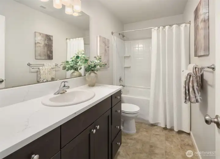 Second level full bath with new quartz countertop