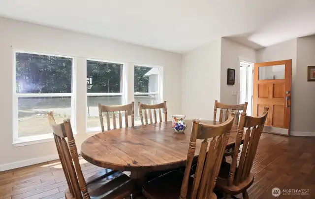 Dining Room with three generously sized windows.