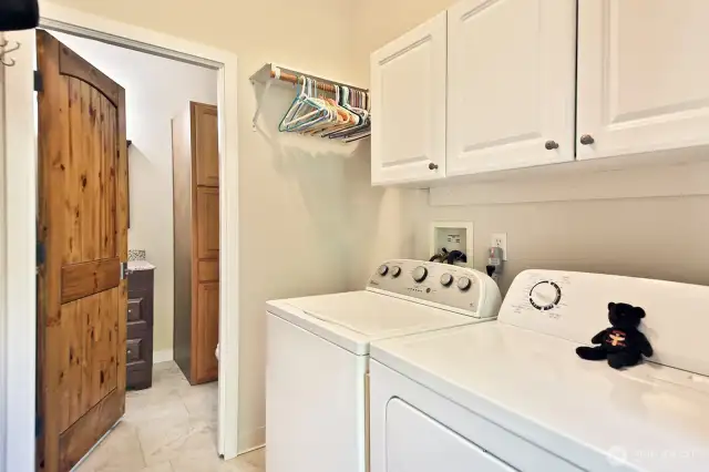 The laundry room & 1/2 bath are located on the other side of the kitchen.