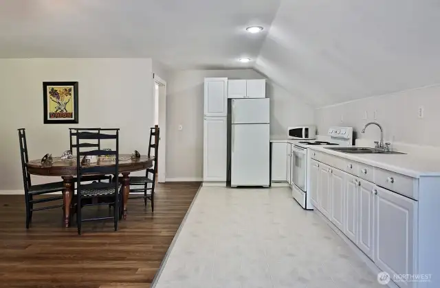 Your view as you enter the apartment. Door to the Guest Suite is through the open door beyond the dining table.