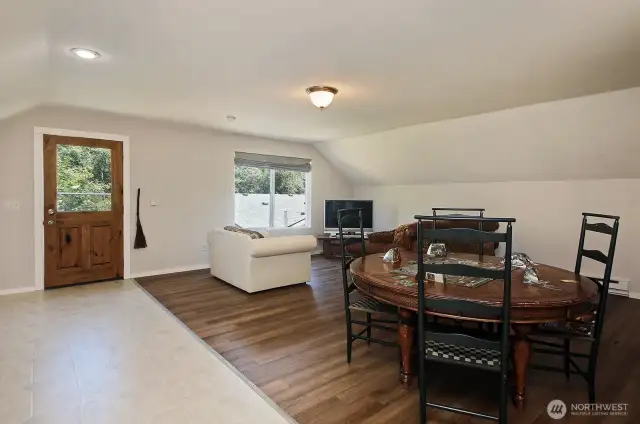 Spacious Living/Dining space in Apartment above Garage/Shop. The Kitchen is to your back.
