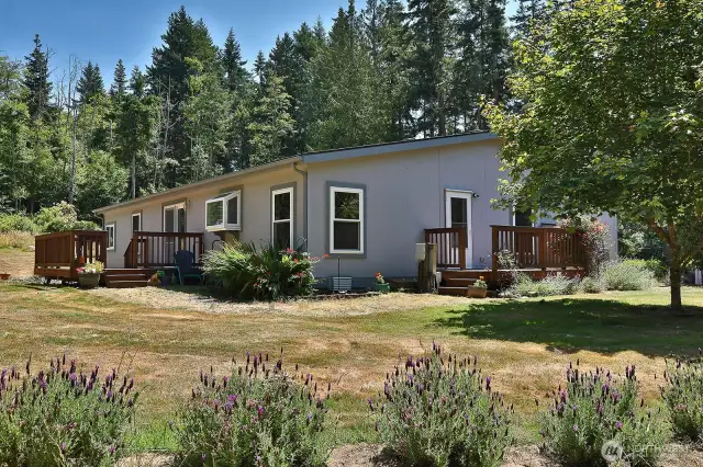 Backside of the house showing both decks.