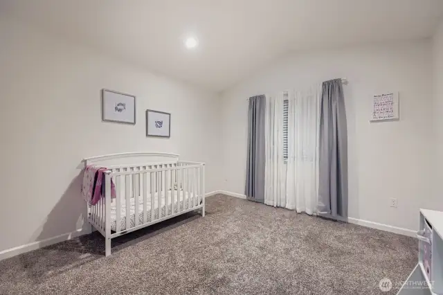 Bedroom with alcove and walk-in closet.