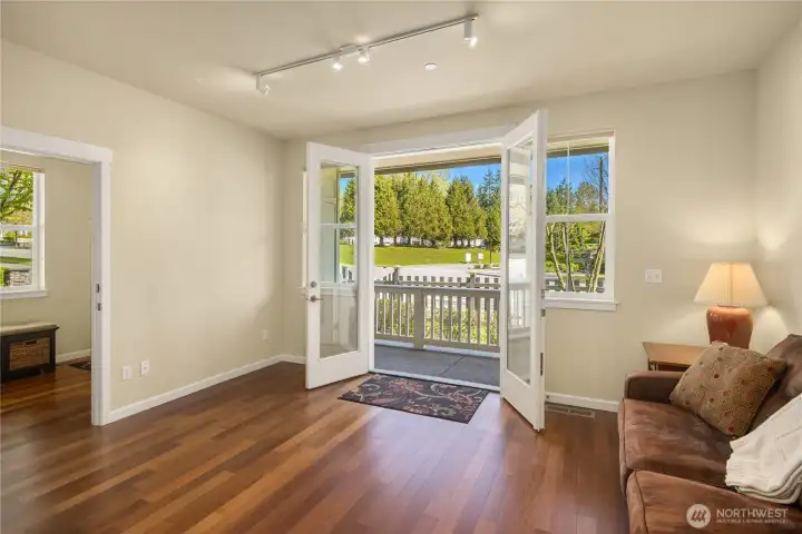 The lower level is flexible for use as a bonus room, den/office, or gym.