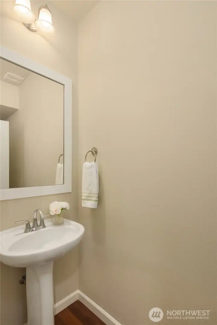 Half bath with pedestal sink.