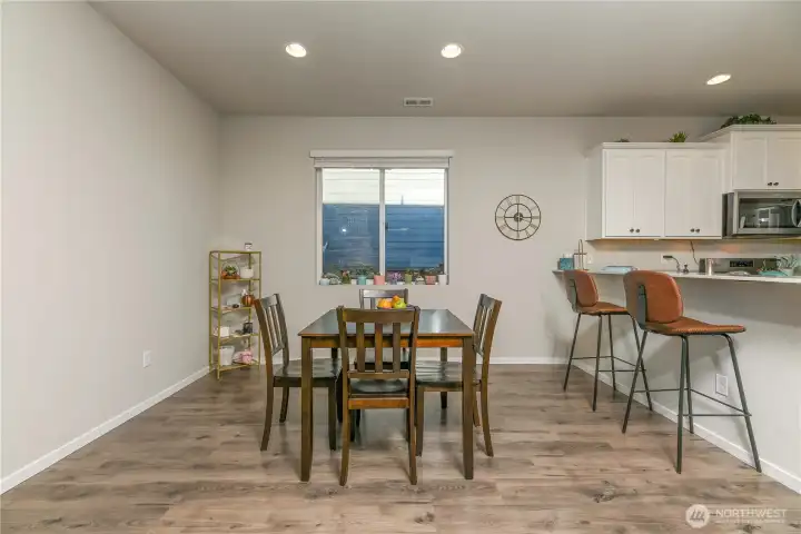 Dining room and eating bar off the kitchen.