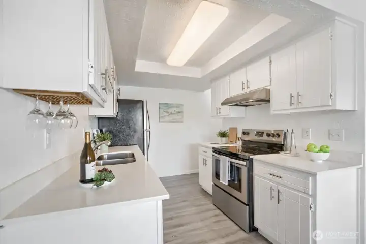 Bright kitchen with ample cabinet and counter space