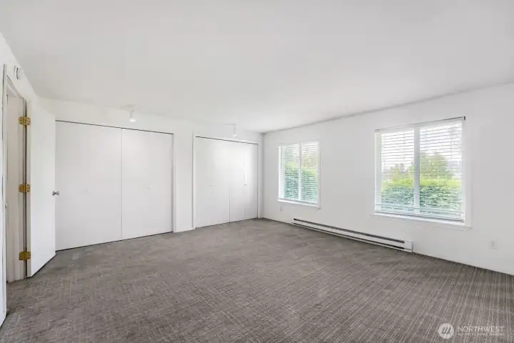 A full wall of closets delivers abundant storage and smart organization, with space to walk from end to end