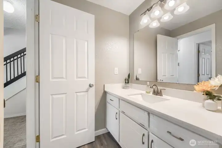 Ample counter space on the bathroom vanity