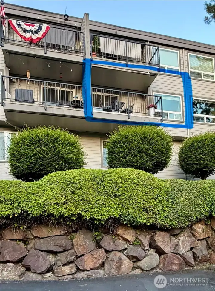 Enjoy lake views from an elevated balcony with added privacy and peace of mind