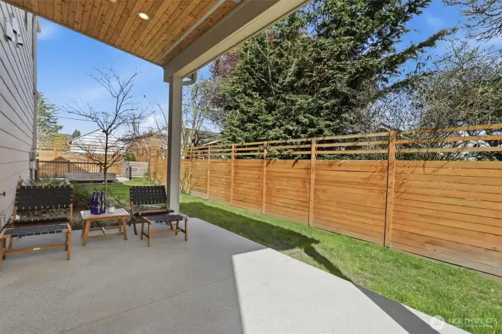 Back patio with fully fenced yard