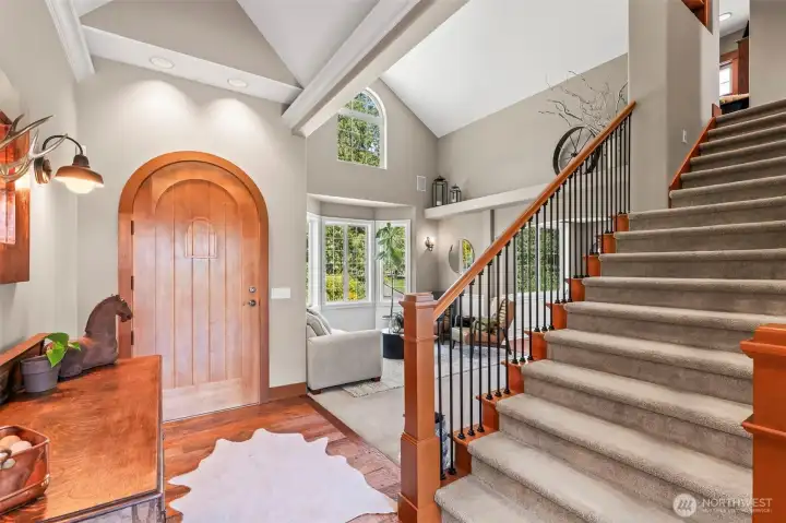 Gorgeous details greet you including a custom made door and real wood flooring.