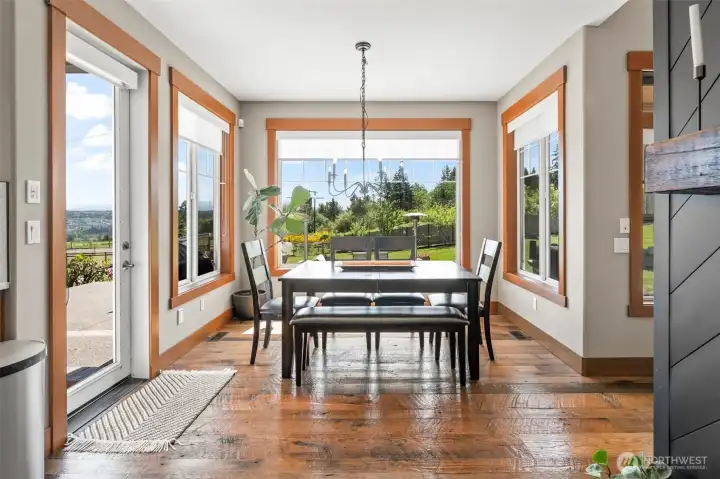 Kitchen nook filled filled with light and surrounded by mountain views.