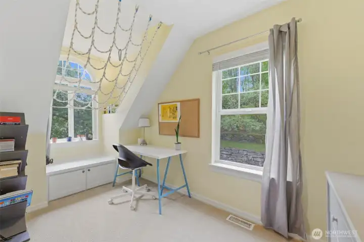 Bedroom 4 has built in bench with storage. Sit and read a book while you stare at the mountain.