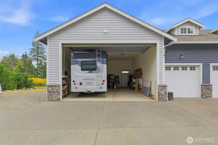 RV garage holds two RV's/boats/etc.