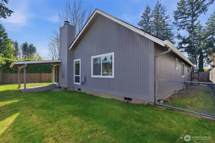 Fully fenced, private back yard with a dog run