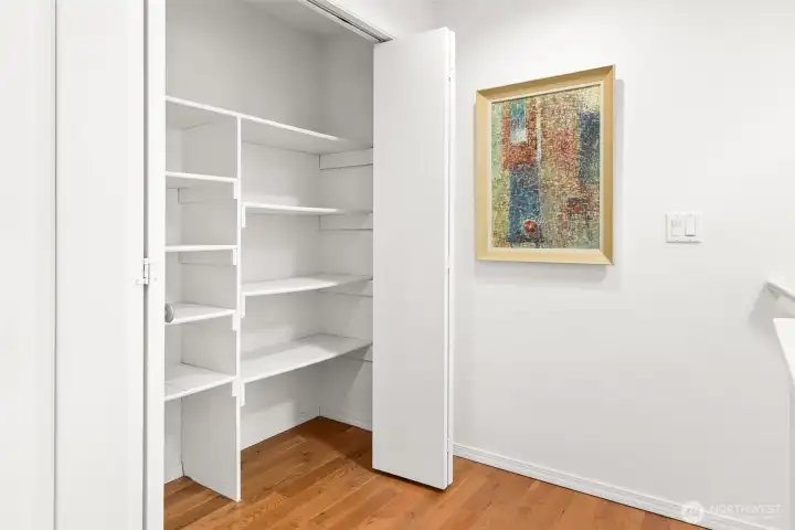 Landing on the upper level. Great closet for linens and storage.