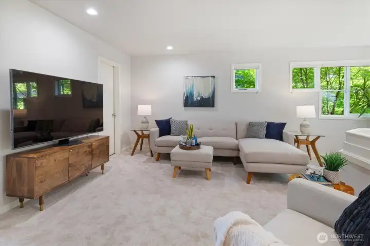 Open 3rd bedroom, staged as a bonus room to show flexible use. Easy to enclose if desired.