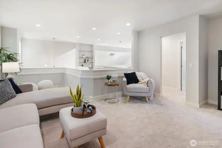 Open 3rd bedroom, staged as a bonus room to show flexible use. Easy to enclose if desired.