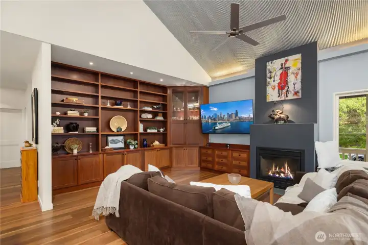 Living room and a wall of shelves using specialty wood from Australia