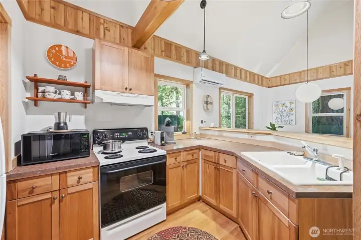 The kitchen overlooks the main living area.