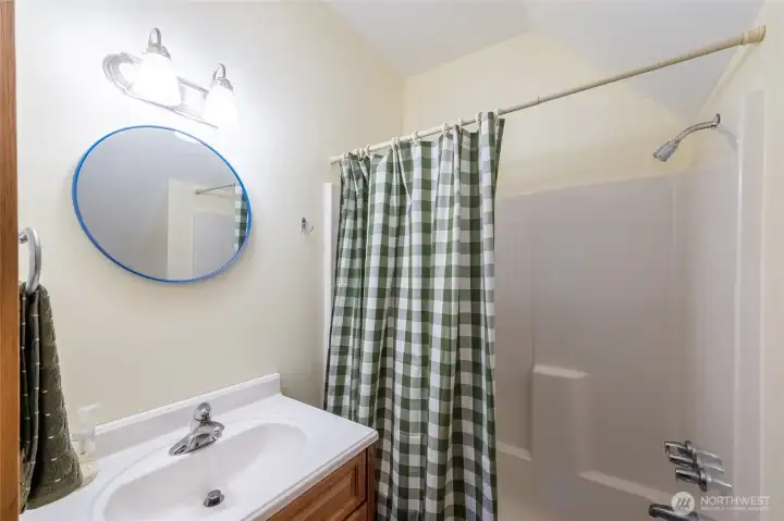 The attached full bathroom upstairs.
