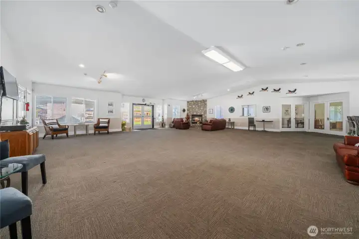 Billiards room through the double doors on the left will soon be updated to a full gym.