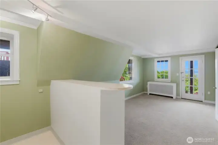 view from basement kitchen into bonus room