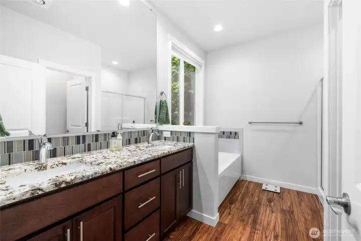 Quality craftsmanship shines through with granite surfaces, white painted millwork, wood-wrapped windows, and elegant finishes throughout Quality craftsmanship shines through with granite surfaces, white painted millwork, wood-wrapped windows, and elegant finishes throughout