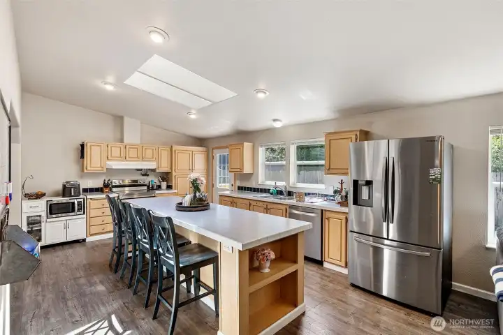 Massive center island with breakfast bar seating.