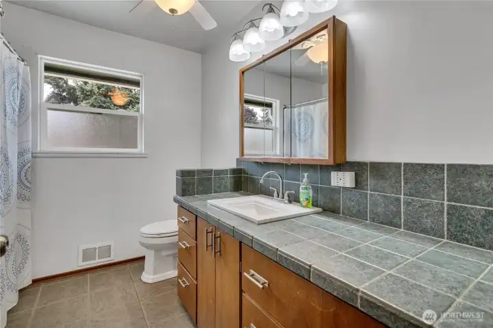 Full bathroom with thoughtful updates. Full bathroom with thoughtful updates.