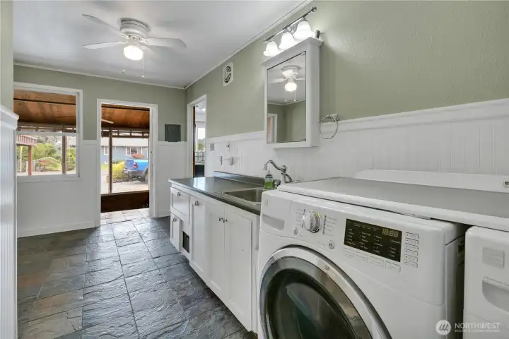 Laundry day just became a little easier. Located off the sunroom entrance. Laundry day just became a little easier. Located off the sunroom entrance.