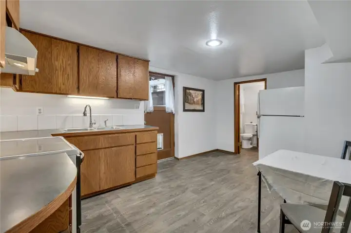 Lower level eat-in kitchen with a private entrance. Lower level eat-in kitchen with a private entrance.