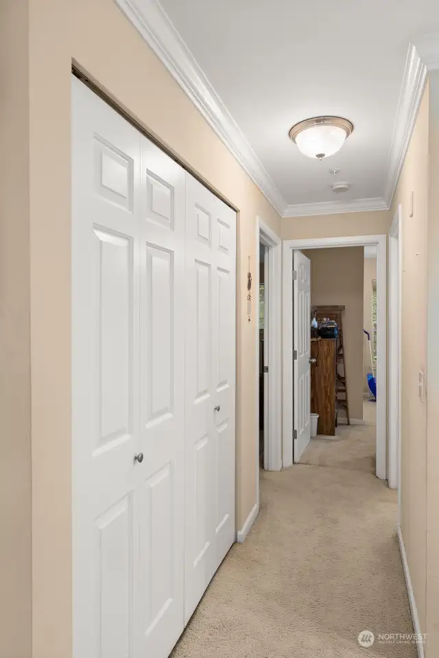 Utility room in hallway. Full size washer and dryer for your convenience.