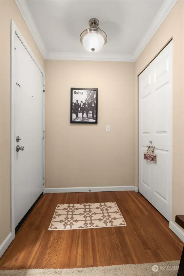 Formal entry into the condo has easy care laminate flooring. A full-size coat closet that easily accommodates vacuums, shoes, bags and more.