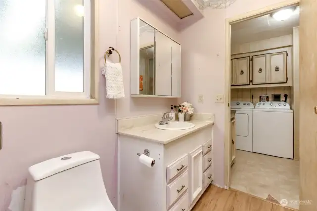 Guest Bathroom Looking Into The Laundry Room